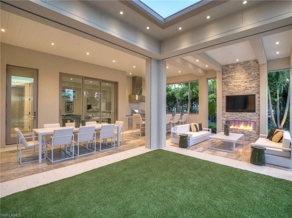 6598 Ridgewood Drive Naples, FL 34108 - Photo 32 of 34 Outdoor living/yoga lawn