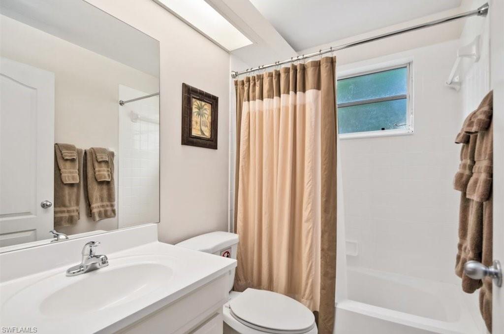 18269 Columbine Road Fort Myers, FL 33967 - Photo 19 of 29 a bathroom with a sink toilet and shower