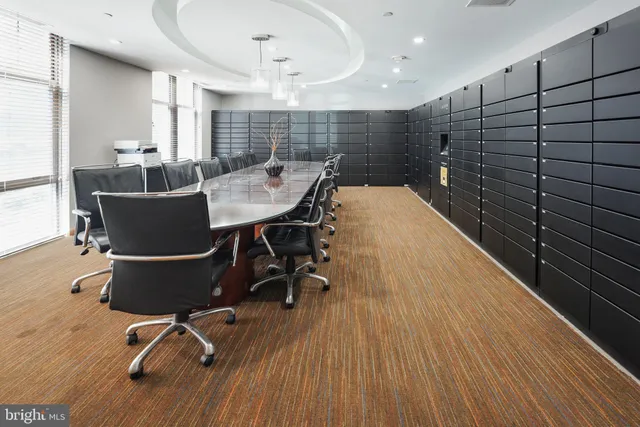 a room with wooden floor and furniture