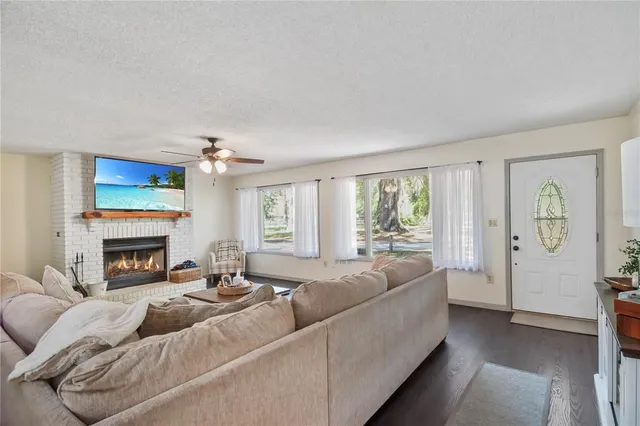 a kitchen with stainless steel appliances a refrigerator a stove and a sink