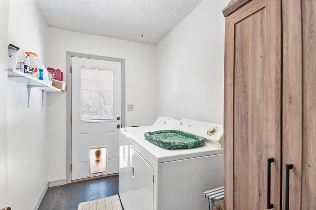 a bathroom with a sink toilet and mirror