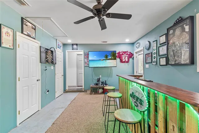 a bathroom with a sink a mirror and a window