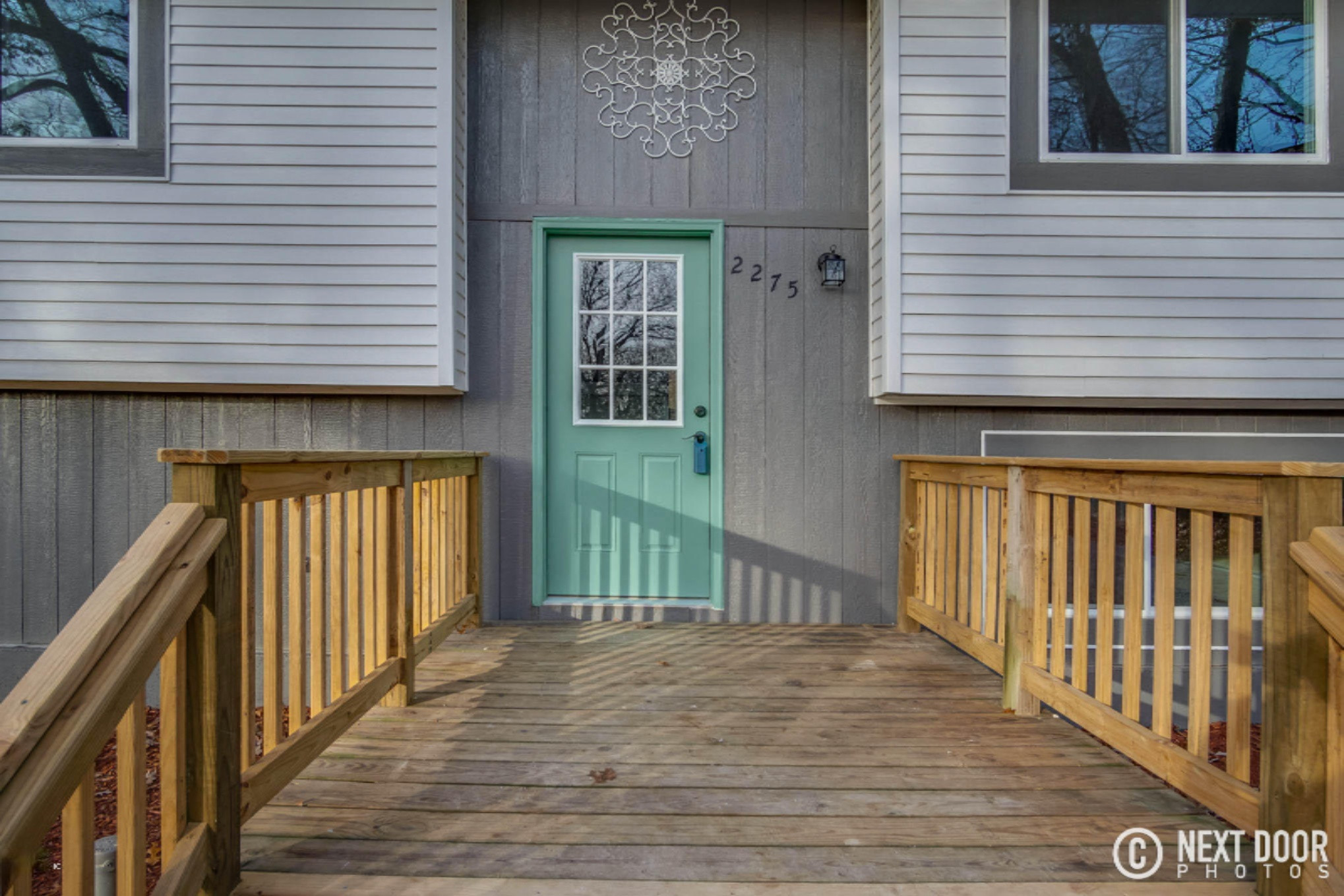 2275 Pillon Road Twin Lake, MI 49457 - Photo 4 of 44 Front Deck & Entry