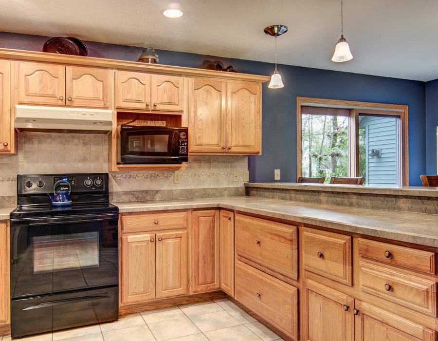 61 North Dakota Road Ridott, IL 61067 - Photo 8 of 25 a kitchen with granite countertop cabinets stainless steel appliances and a sink