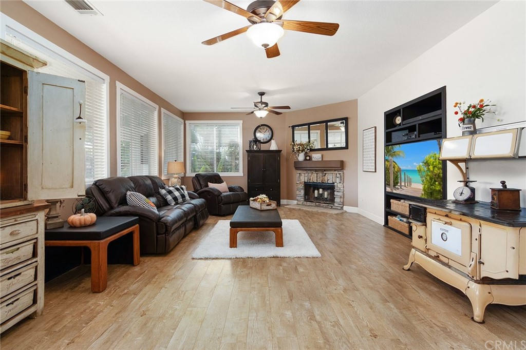 31500 Britton Circle Temecula, CA 92591 - Photo 12 of 68 a living room with furniture and a fireplace