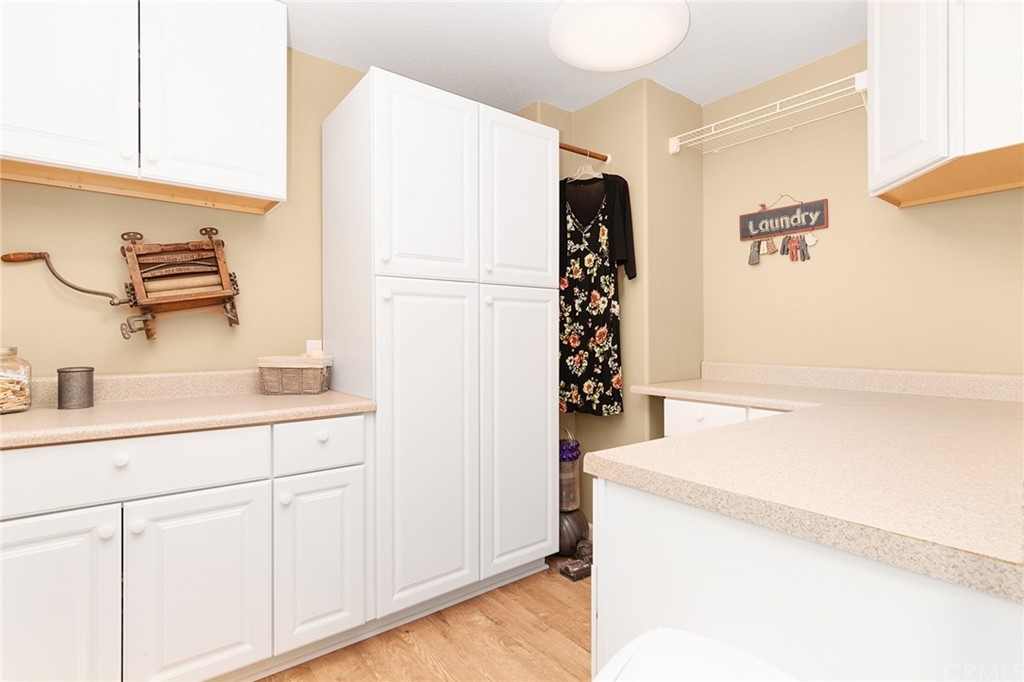 31500 Britton Circle Temecula, CA 92591 - Photo 17 of 68 a kitchen with a refrigerator and a sink