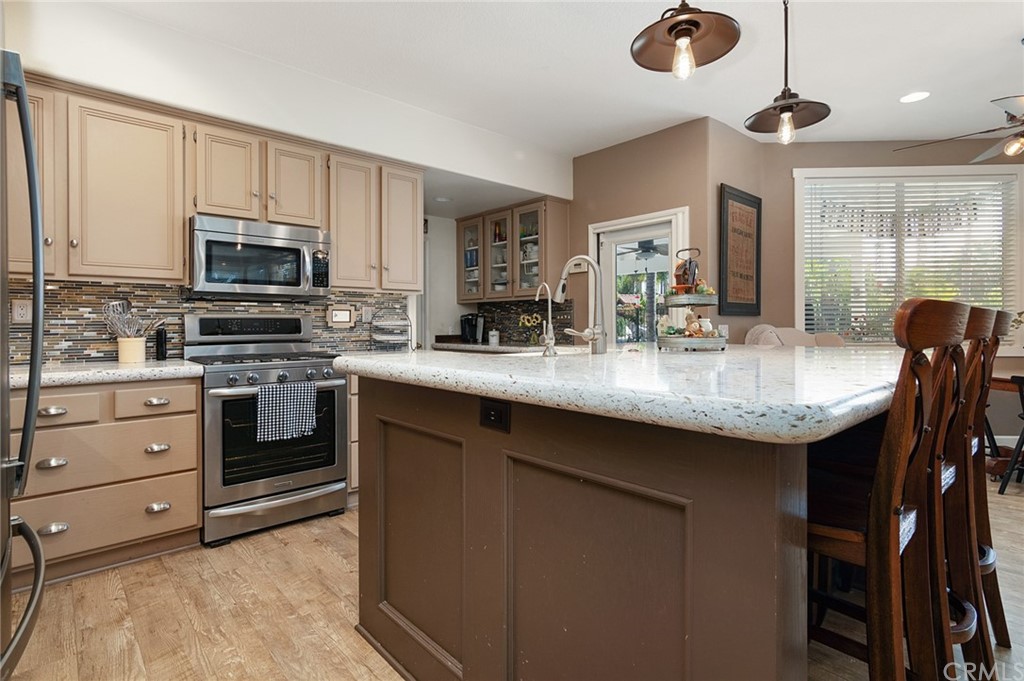 31500 Britton Circle Temecula, CA 92591 - Photo 3 of 68 a kitchen with appliances cabinets and furniture