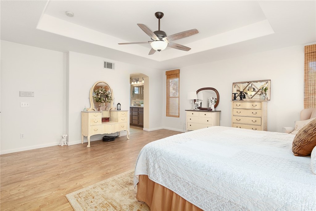 31500 Britton Circle Temecula, CA 92591 - Photo 24 of 68 a bedroom with a bed and a dresser