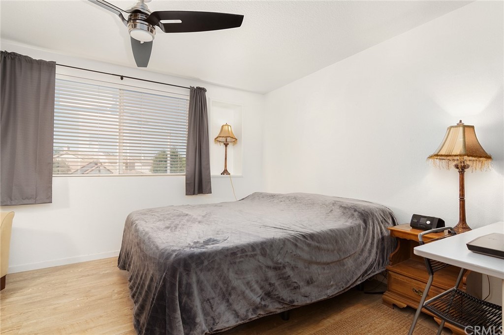 31500 Britton Circle Temecula, CA 92591 - Photo 31 of 68 a bedroom with a bed and a table