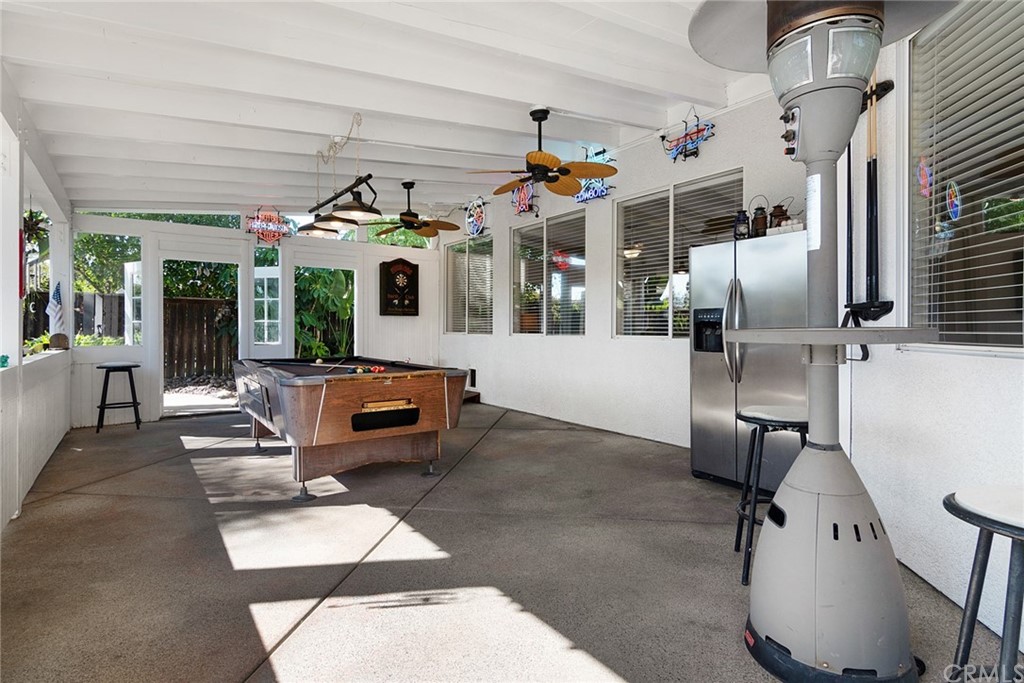 31500 Britton Circle Temecula, CA 92591 - Photo 36 of 68 a living room with furniture and a chandelier