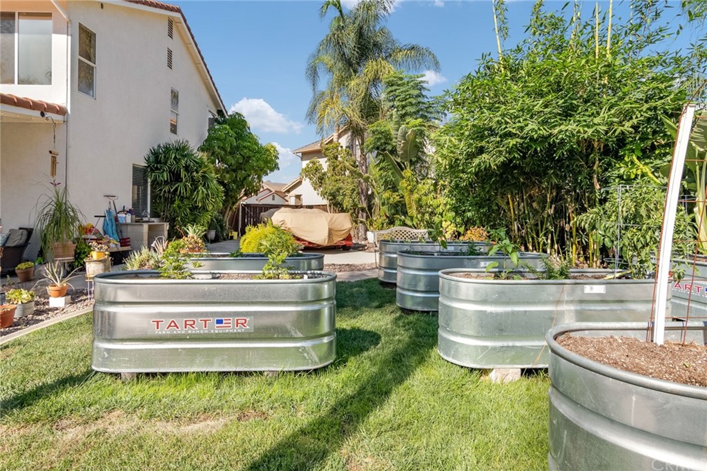 31500 Britton Circle Temecula, CA 92591 - Photo 48 of 68 a view of a swimming pool with a garden