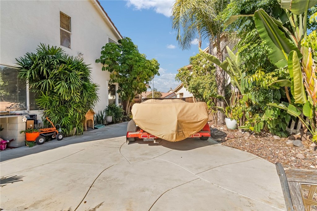 31500 Britton Circle Temecula, CA 92591 - Photo 50 of 68 a view of a backyard with a sink and potted plants