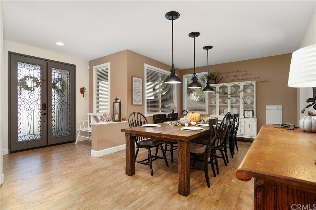 31500 Britton Circle Temecula, CA 92591 - Photo 7 of 68 a view of a dining room with furniture window and wooden floor