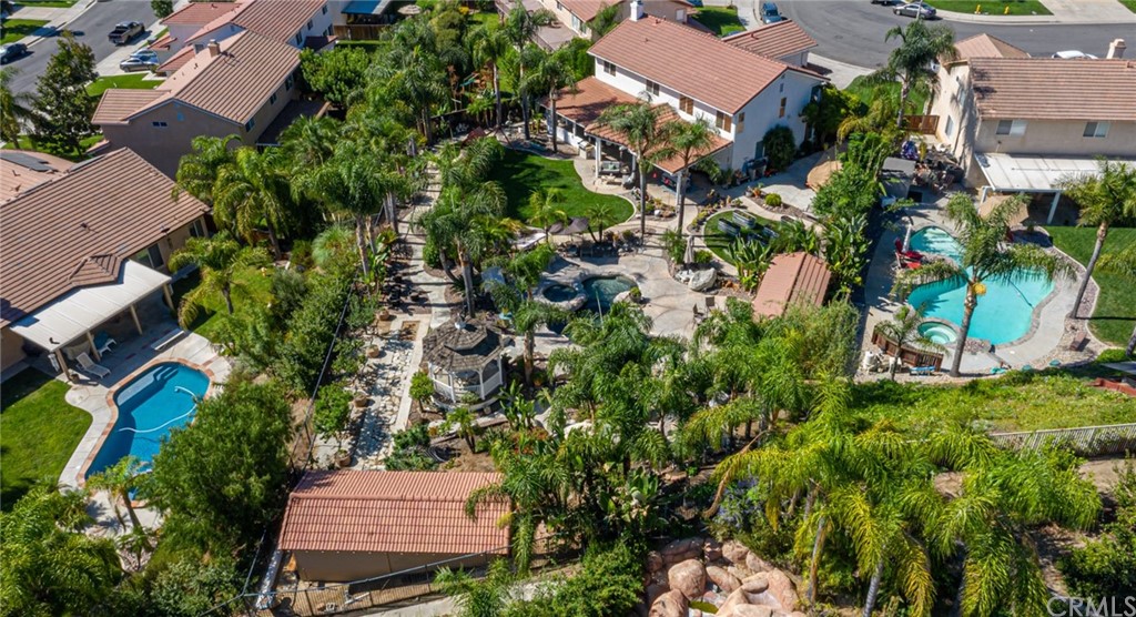 31500 Britton Circle Temecula, CA 92591 - Photo 68 of 68 an aerial view of a house with a yard and garden