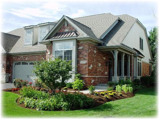 front view of a house with a yard