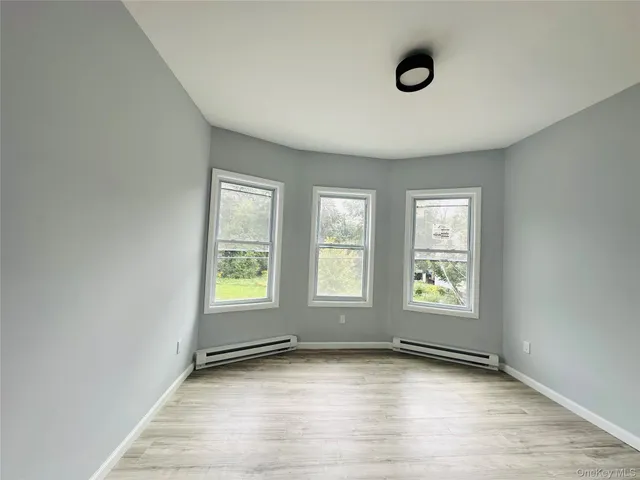an empty room with window