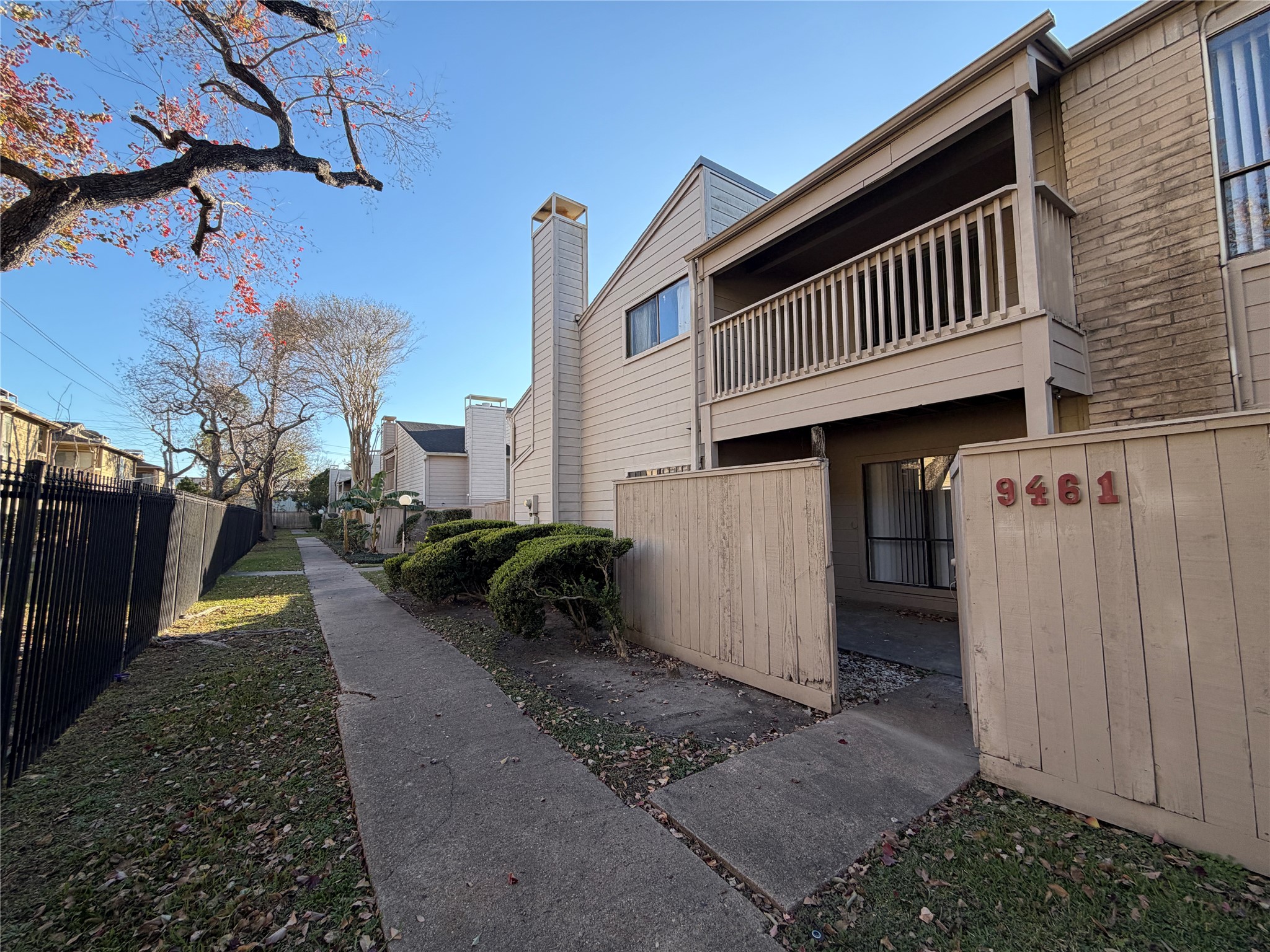 9461 Pagewood Lane, Unit 9461 Houston, TX 77063 - Photo 2 of 33 a view of a house with backyard and sitting area