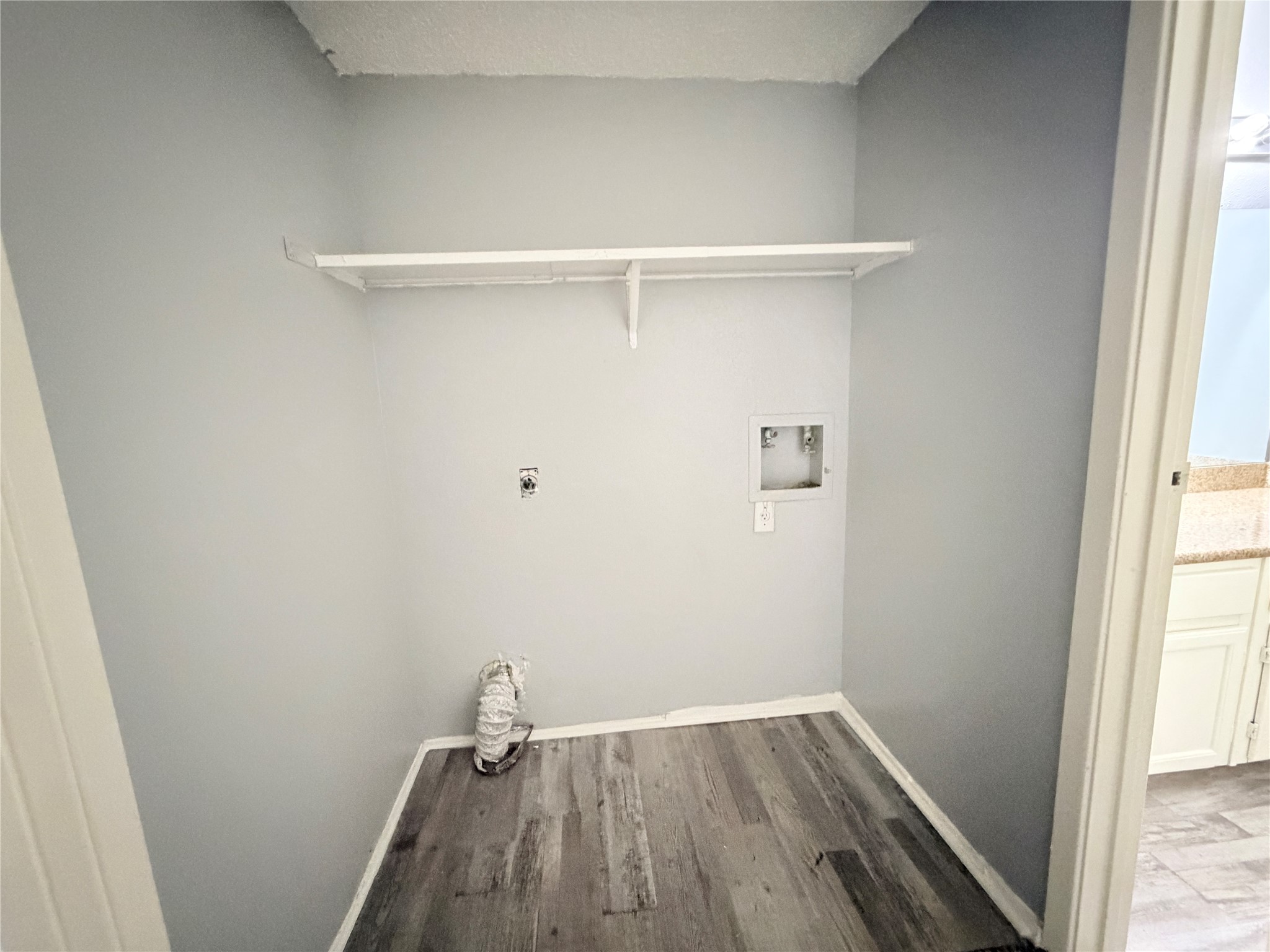 9461 Pagewood Lane, Unit 9461 Houston, TX 77063 - Photo 28 of 33 a view of small space with wooden floor and a window