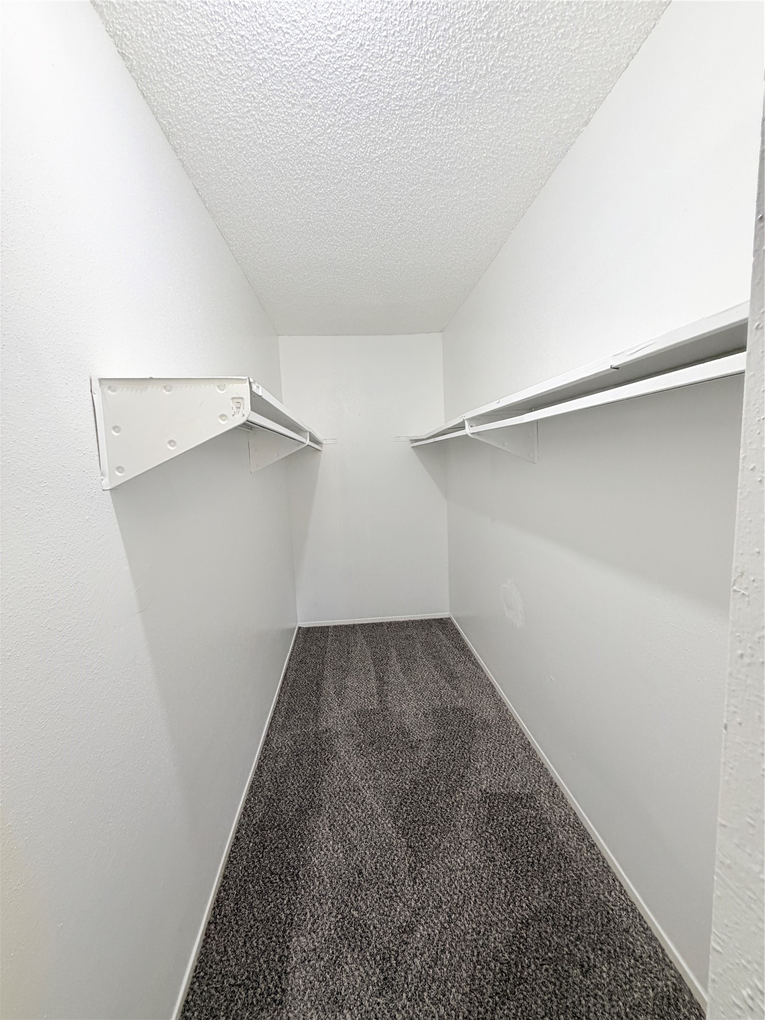 9461 Pagewood Lane, Unit 9461 Houston, TX 77063 - Photo 29 of 33 a view of a room with shelf