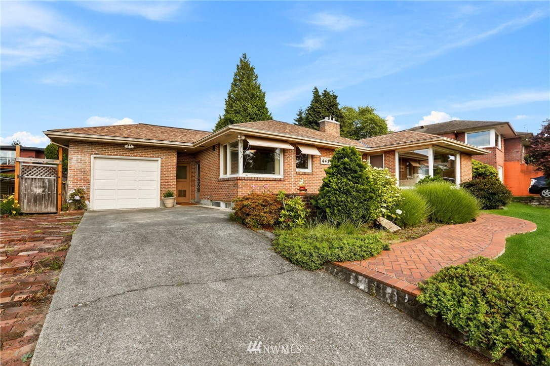 443 View Ridge Drive Everett, WA 98203 - Photo 6 of 35 a front view of a house with a yard and garage