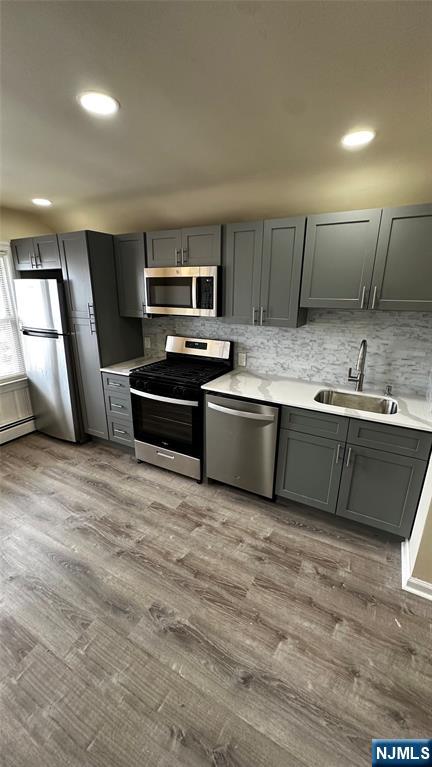 a large kitchen with cabinets a sink and a stove