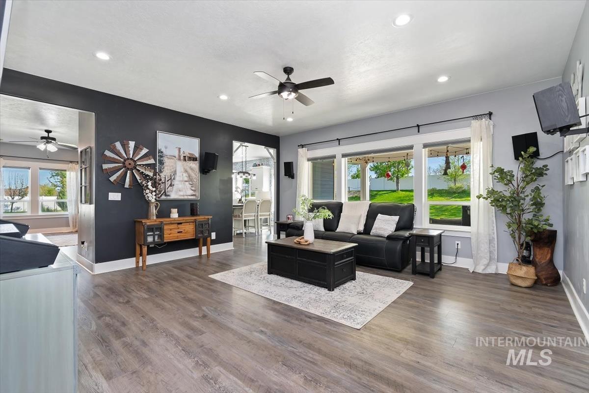 15015 Leon Lane Caldwell, ID 83607 - Photo 14 of 44 Spacious room featuring wood-finish flooring, recessed lighting, and a ceiling fan