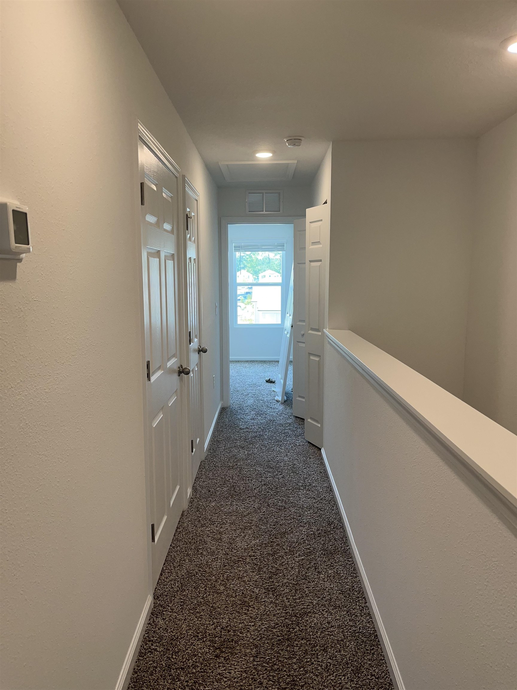 102 Vidalia Ridge Rd Street St. Augustine, FL 32084 - Photo 13 of 29 a view of a hallway