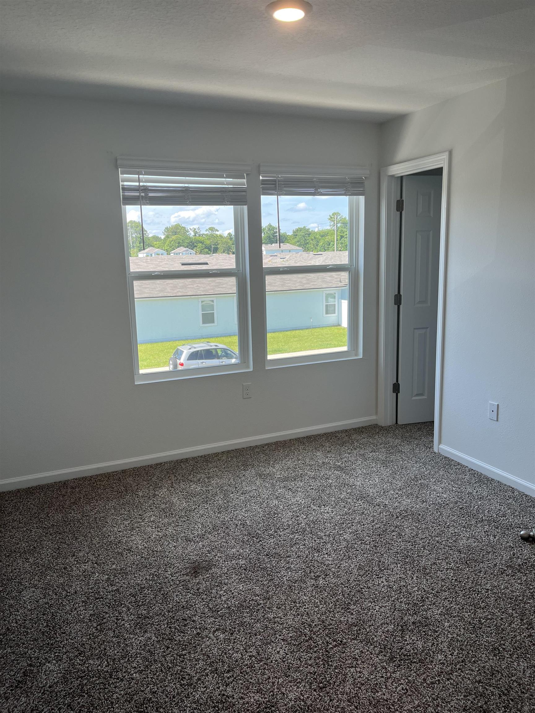 102 Vidalia Ridge Rd Street St. Augustine, FL 32084 - Photo 18 of 29 an empty room with a window