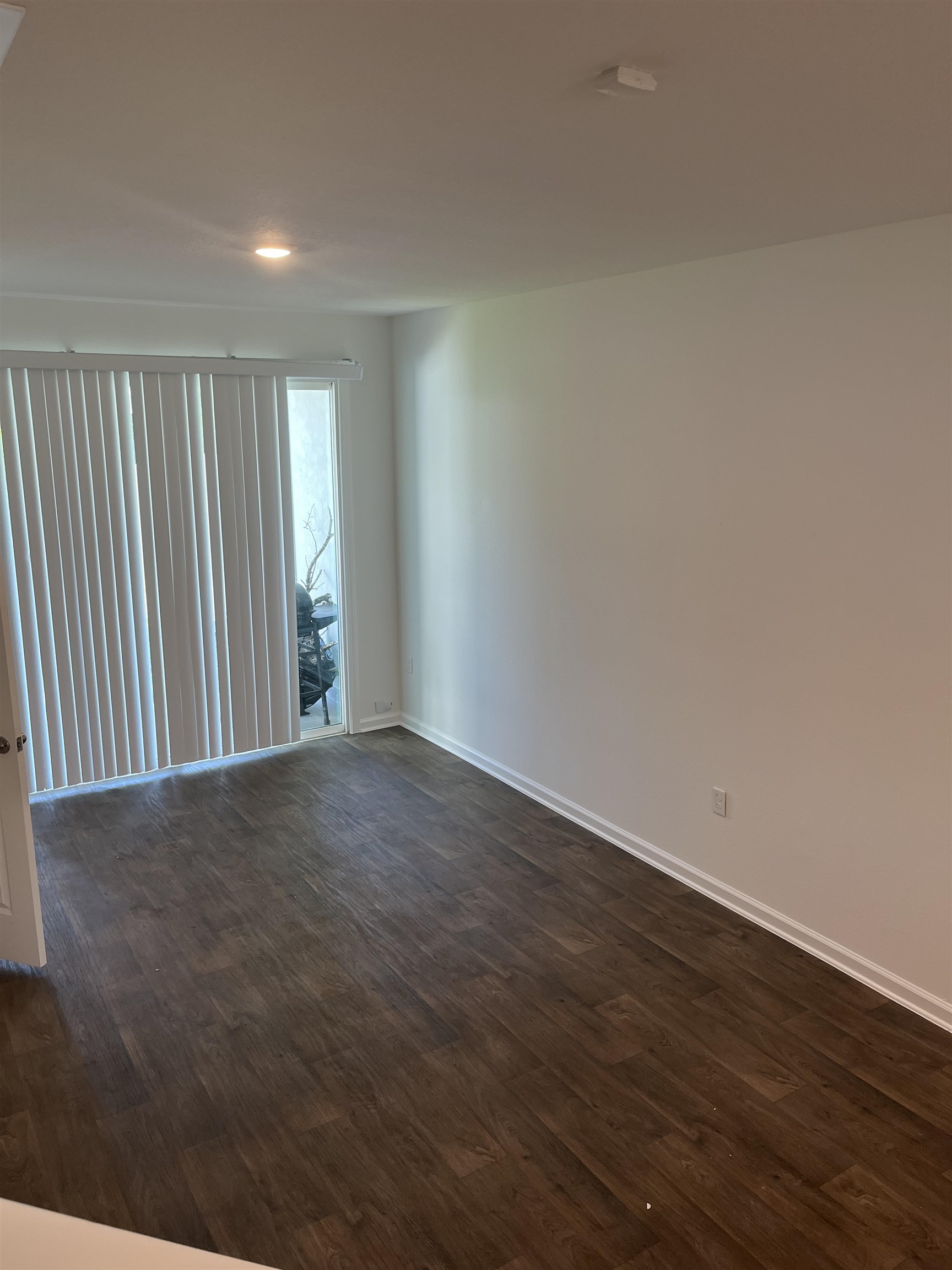 102 Vidalia Ridge Rd Street St. Augustine, FL 32084 - Photo 20 of 29 a view of an empty room with wooden floor