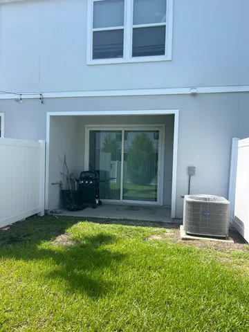 a picture of a bathroom with a shower and a mirror