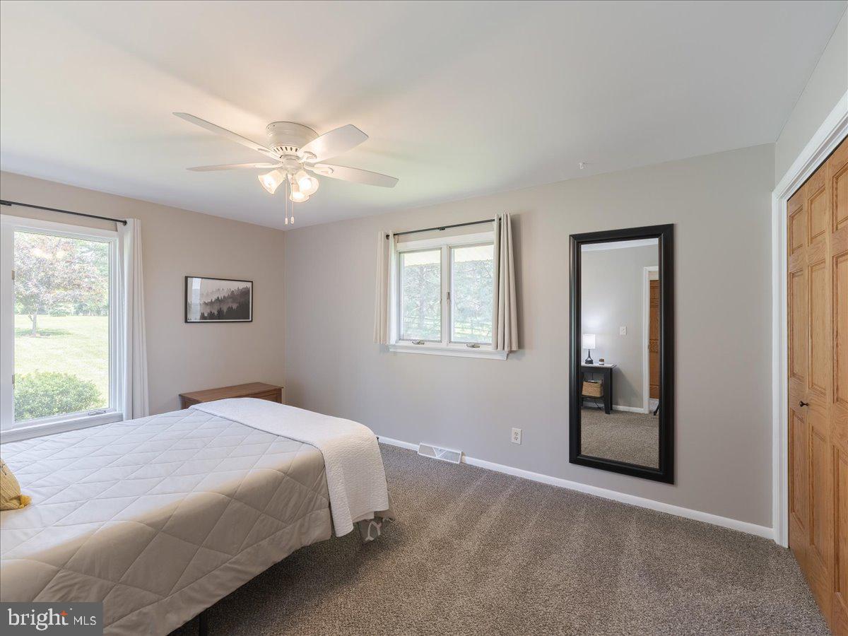 102 Upper Valley Road Christiana, PA 17509 - Photo 24 of 75 a bedroom with a large bed and a window