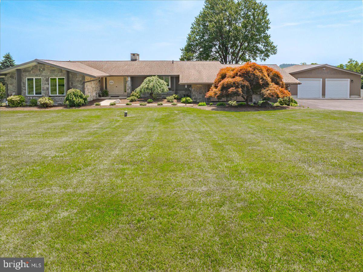 102 Upper Valley Road Christiana, PA 17509 - Photo 3 of 75 a view of a house with a yard and garage