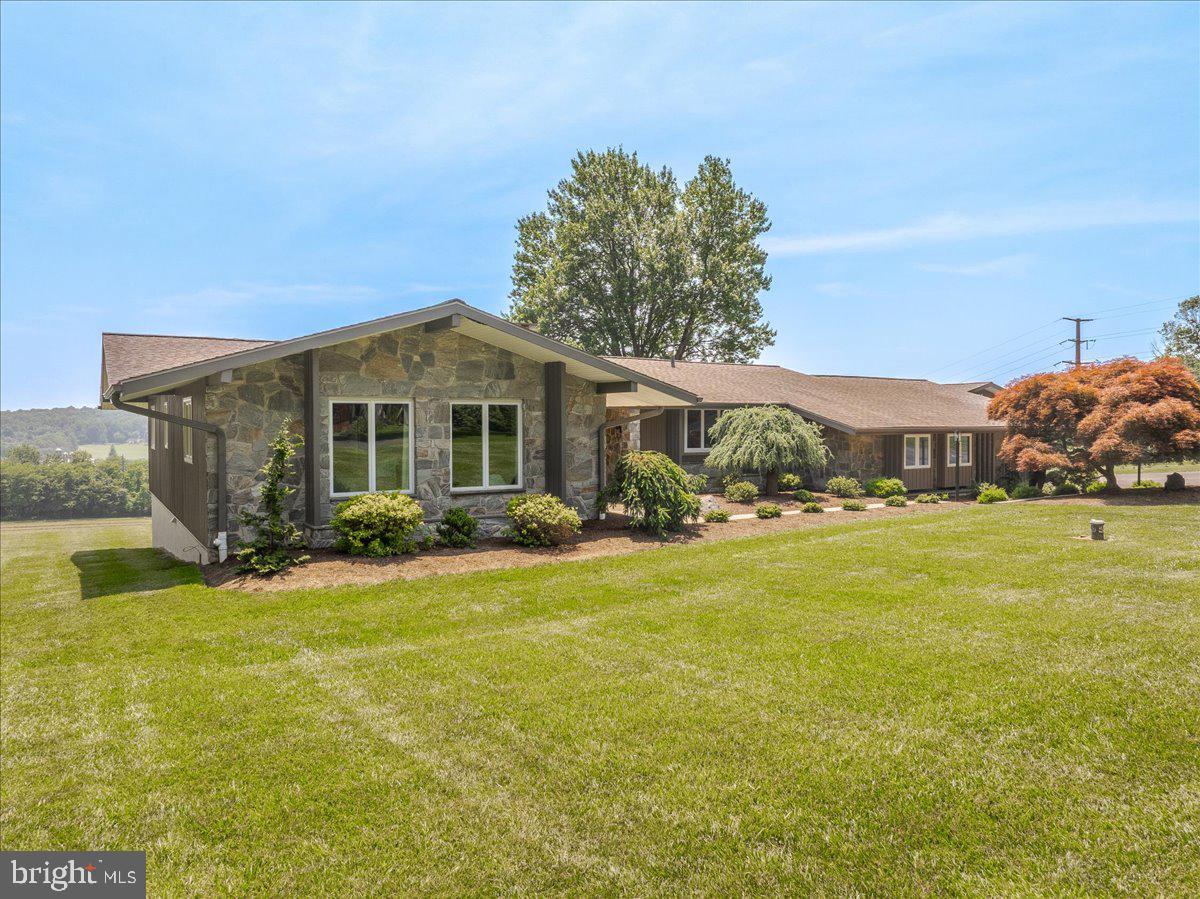 102 Upper Valley Road Christiana, PA 17509 - Photo 4 of 75 a front view of house with yard and green space