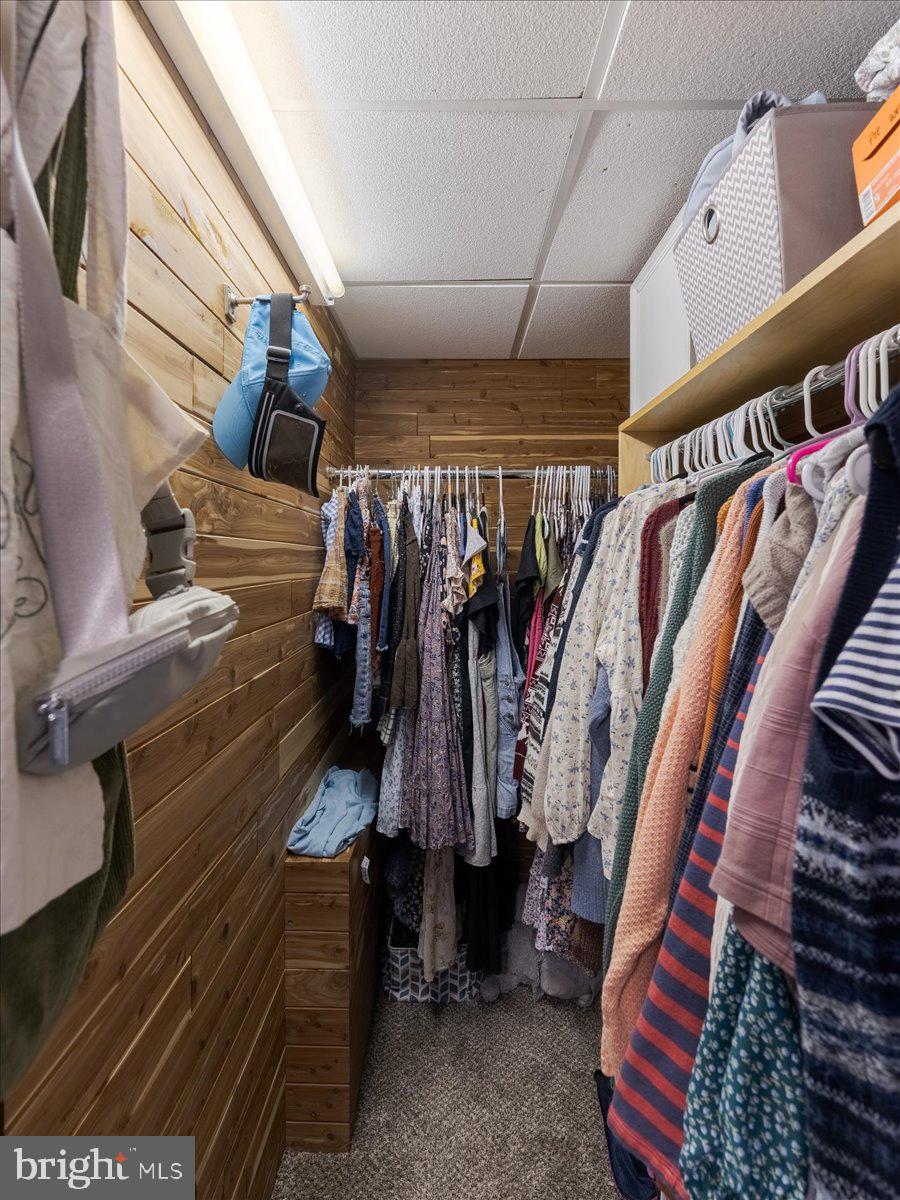 102 Upper Valley Road Christiana, PA 17509 - Photo 41 of 75 a view of walk in closet with clothes and shoes