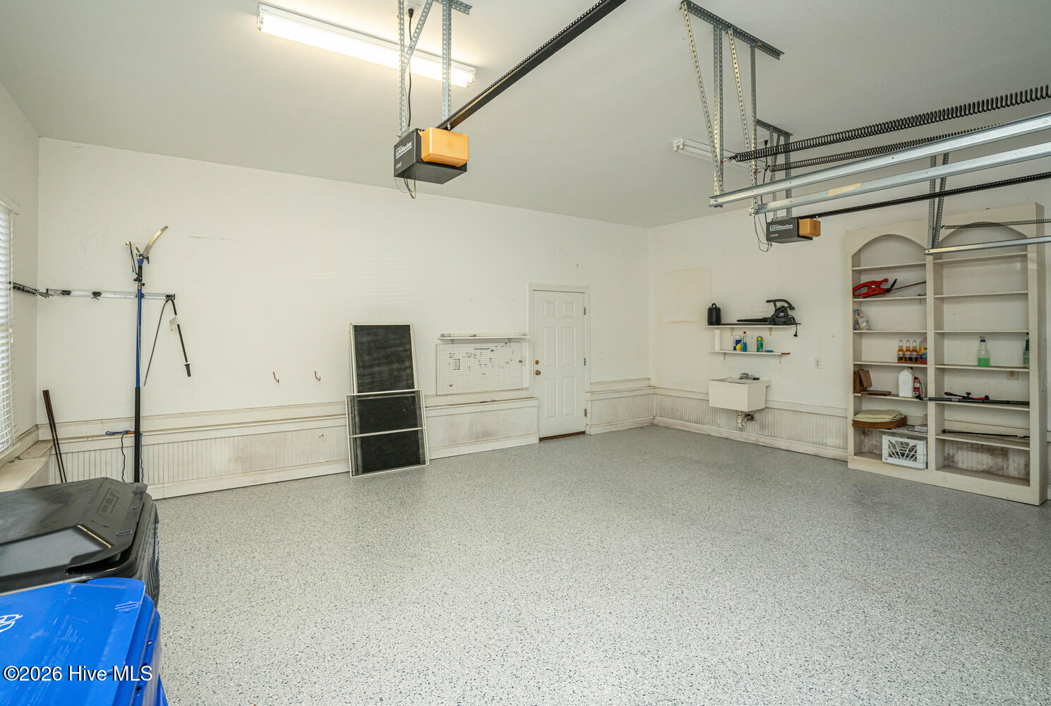 523 Candlewick Lane Southwest Ocean Isle Beach, NC 28469 - Photo 45 of 85 Garage with Epoxy Coating on Floor and Utility Sink