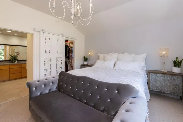 a bathroom with a double vanity sink and a toilet
