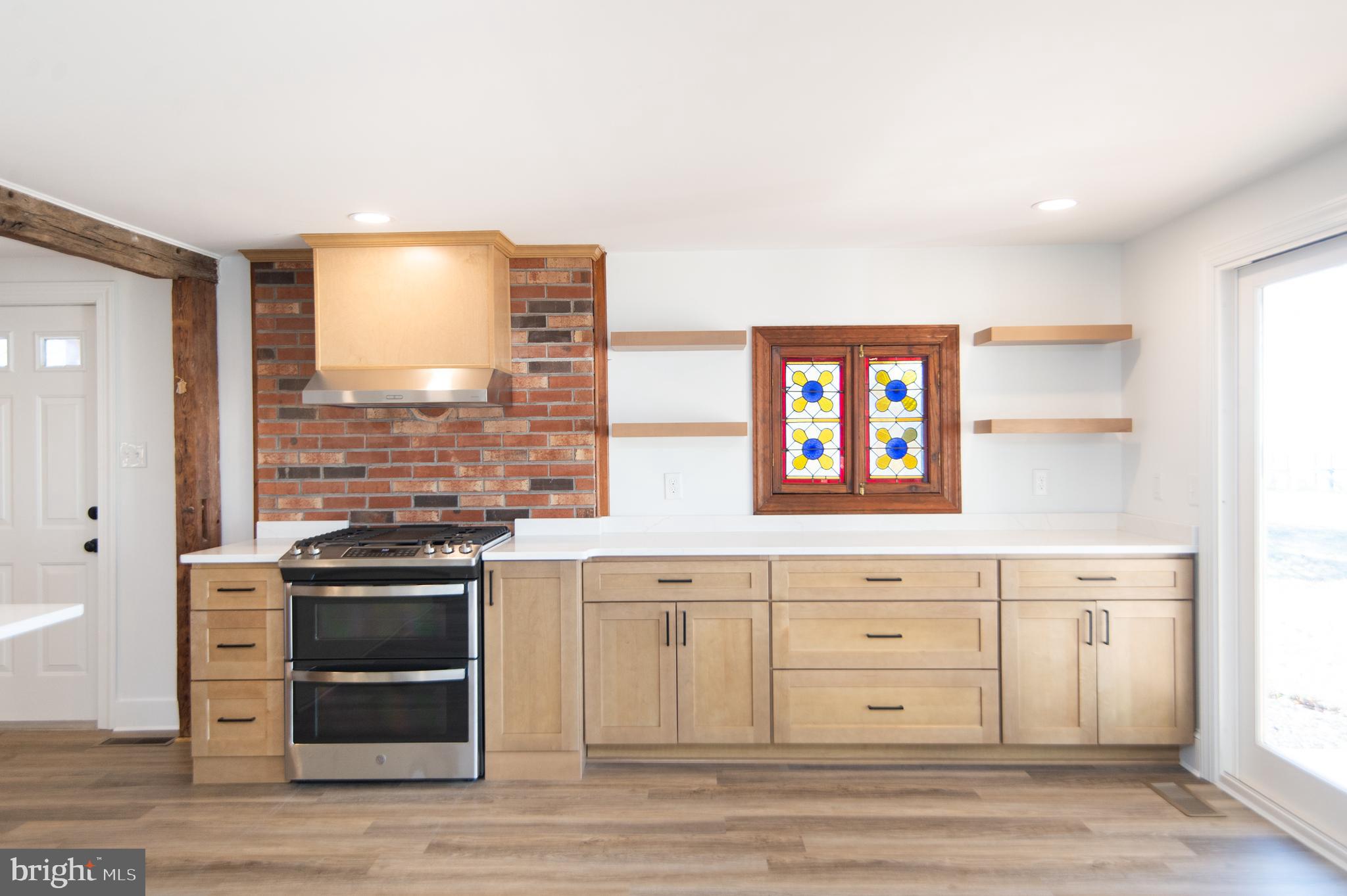 11453 Riverton Road Mardela Springs, MD 21837 - Photo 11 of 71 a view of cabinets a wooden floor and a window