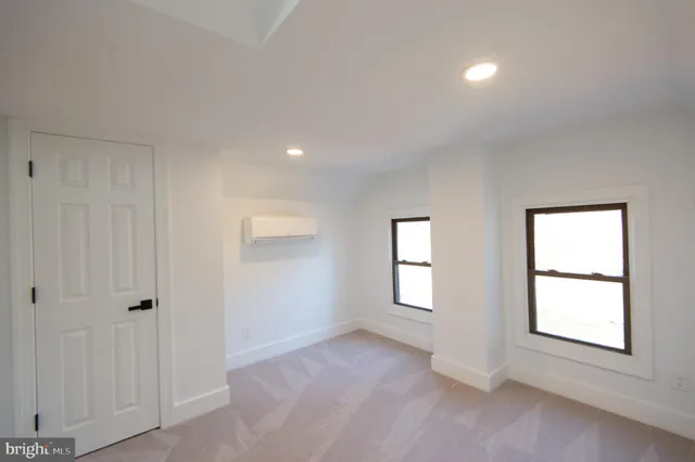 a view of a big room with wooden floor