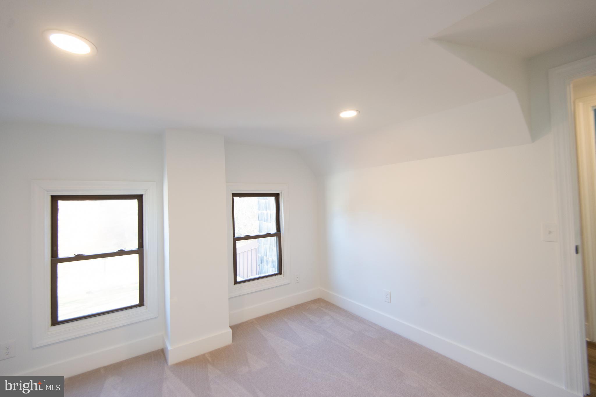 11453 Riverton Road Mardela Springs, MD 21837 - Photo 36 of 71 an empty room with windows and closet