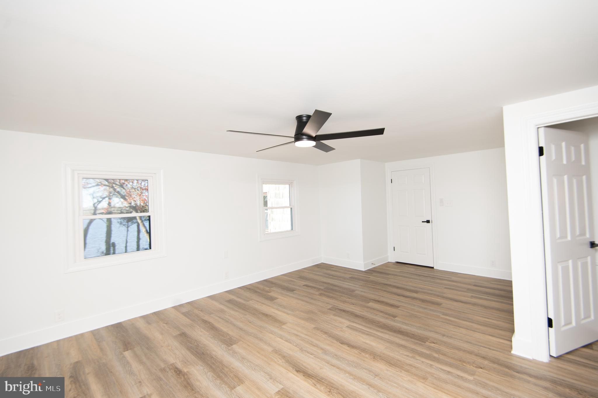 11453 Riverton Road Mardela Springs, MD 21837 - Photo 46 of 71 a view of a big room with wooden floor