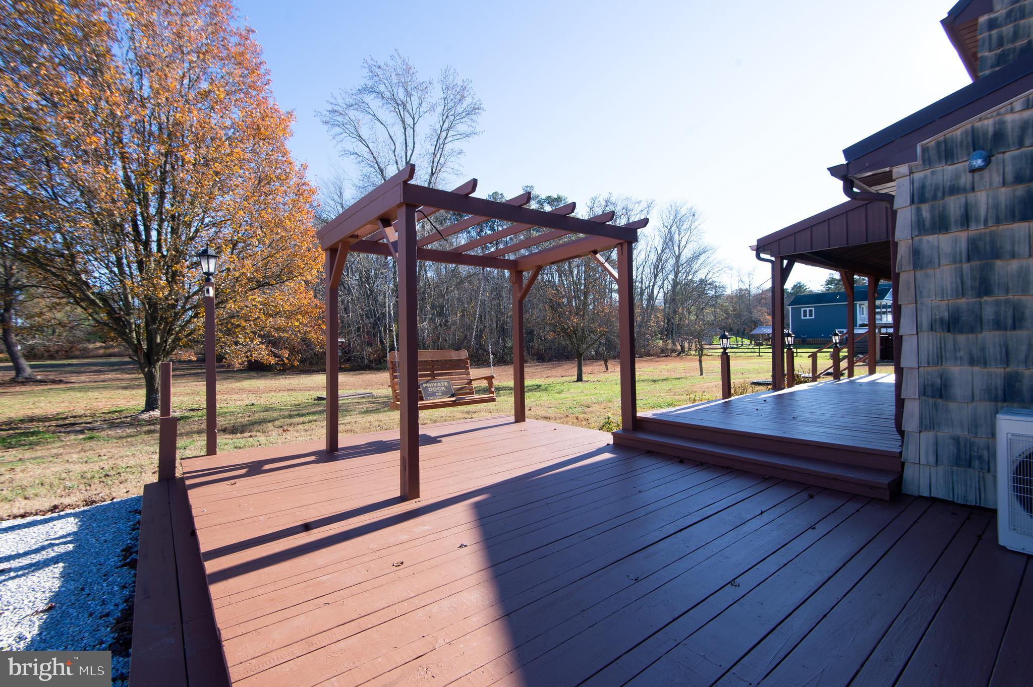 11453 Riverton Road Mardela Springs, MD 21837 - Photo 57 of 71 a view of a swimming pool with a patio