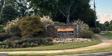 275 Rehobeth Way Fayetteville, GA 30214 - Photo 25 of 25 a sign that is sitting on the side of a road