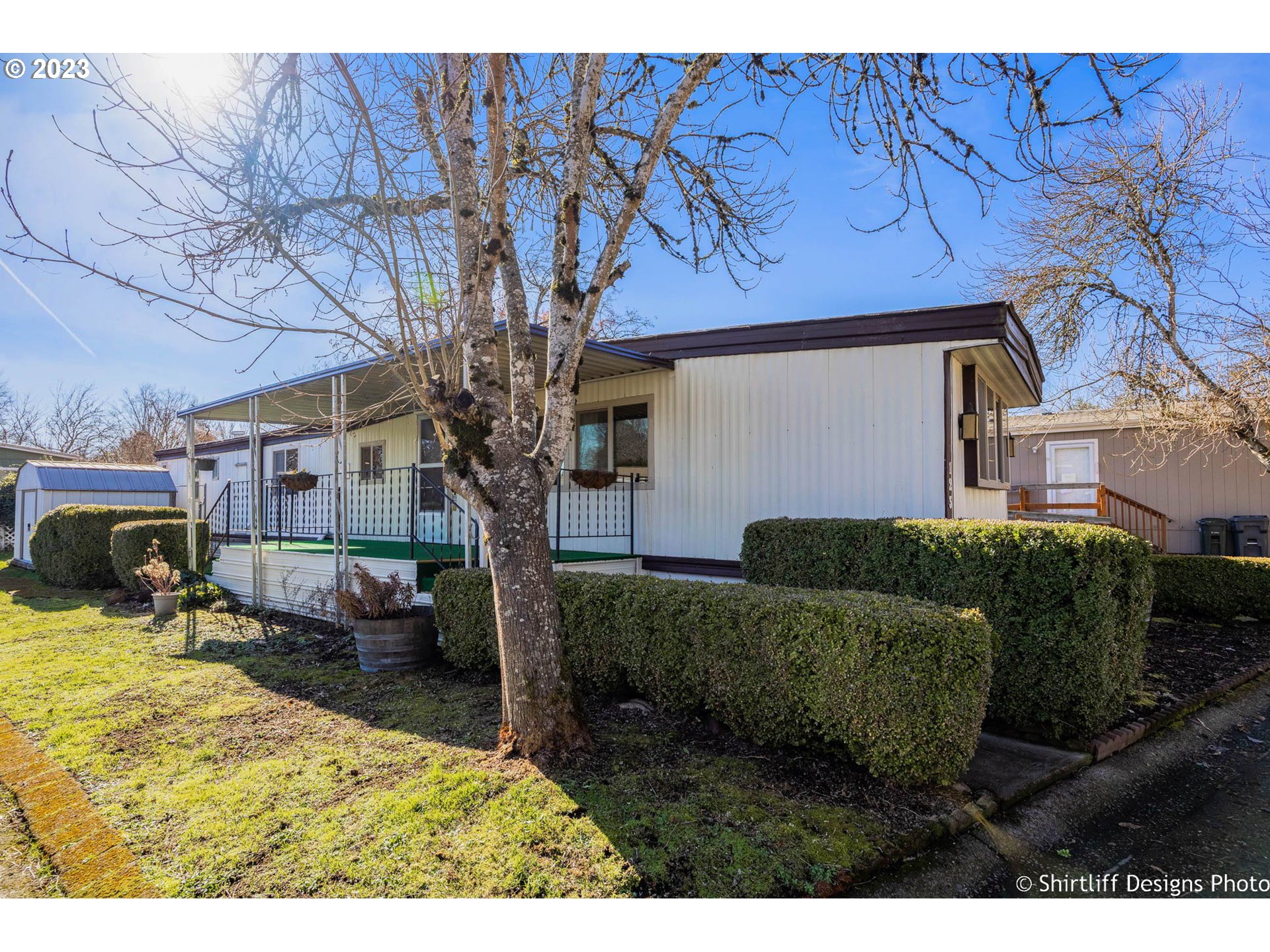 1475 Green Acres Road, Unit 123 Eugene, OR 97408 - Photo 3 of 23 a view of a house with a yard