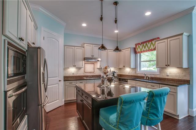 175 Azalea Lane Franklin, TN 37064 - Photo 8 of 20 Dream kitchen with high end cabinets, all stainless steel appliances, and a huge island with bar area.