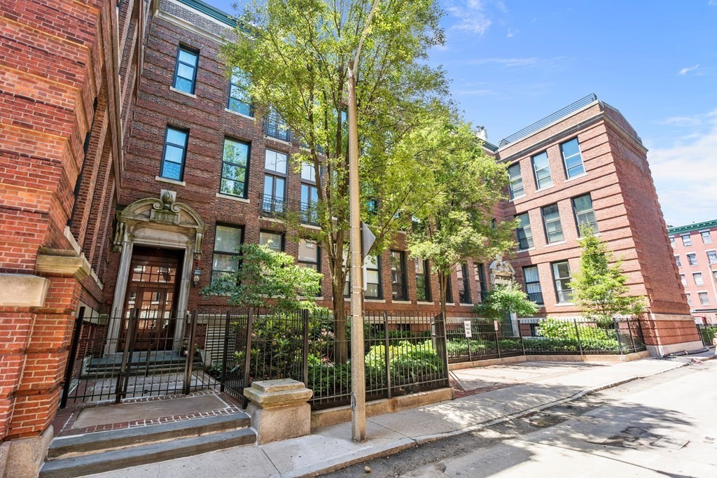 20 Tileston Street, Unit 2H Boston, MA 02113 - Photo 1 of 22 a view of a building with a yard