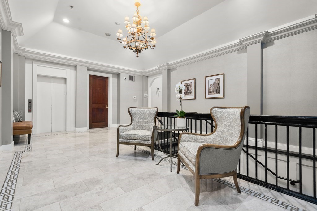 20 Tileston Street, Unit 2H Boston, MA 02113 - Photo 14 of 22 a view of a balcony with furniture and chandelier