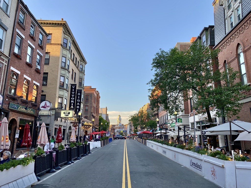 20 Tileston Street, Unit 2H Boston, MA 02113 - Photo 20 of 22 a city street lined with buildings and trees
