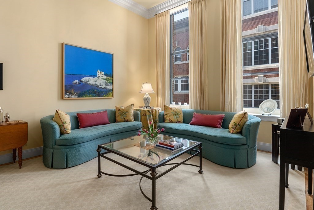 20 Tileston Street, Unit 2H Boston, MA 02113 - Photo 4 of 22 a living room with furniture and a large window