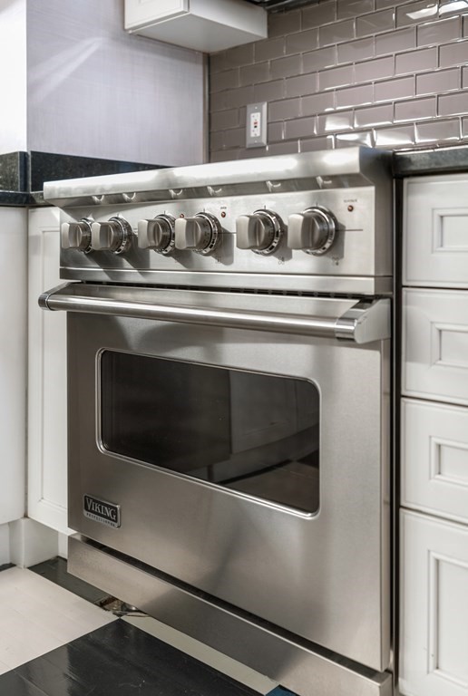 20 Tileston Street, Unit 2H Boston, MA 02113 - Photo 8 of 22 a stove top oven sitting inside of a kitchen