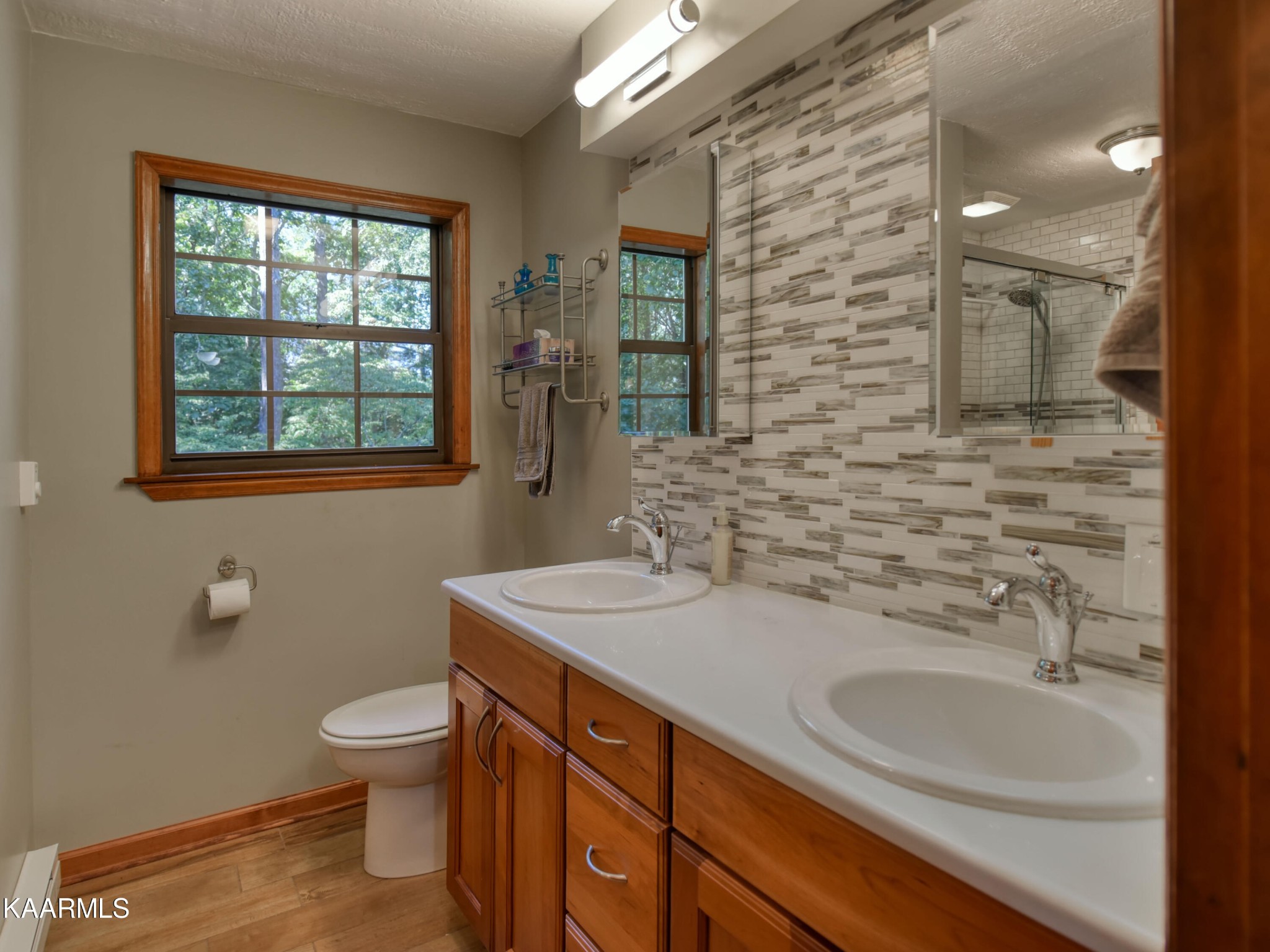 1203 Mountain Road Clinton, TN 37716 - Photo 25 of 59 a bathroom with a sink toilet and window